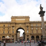 Piazza della Repubblica. The city centre. Beyond the arch is a alley of High end fashion: Ferrari, Louis Vuitton...